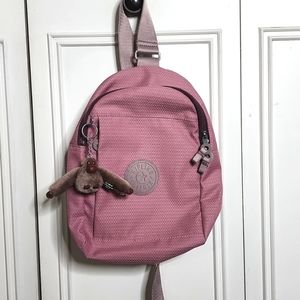 PRICE FIRM. Kipling Pink Klynn Sling Backpack